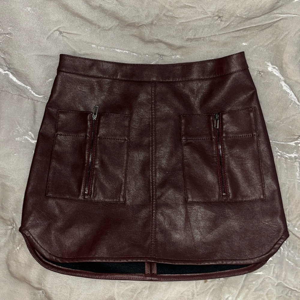 SOLD! BCBG Bordeaux wine colored, Vegan leather mini skirt new with tags XS